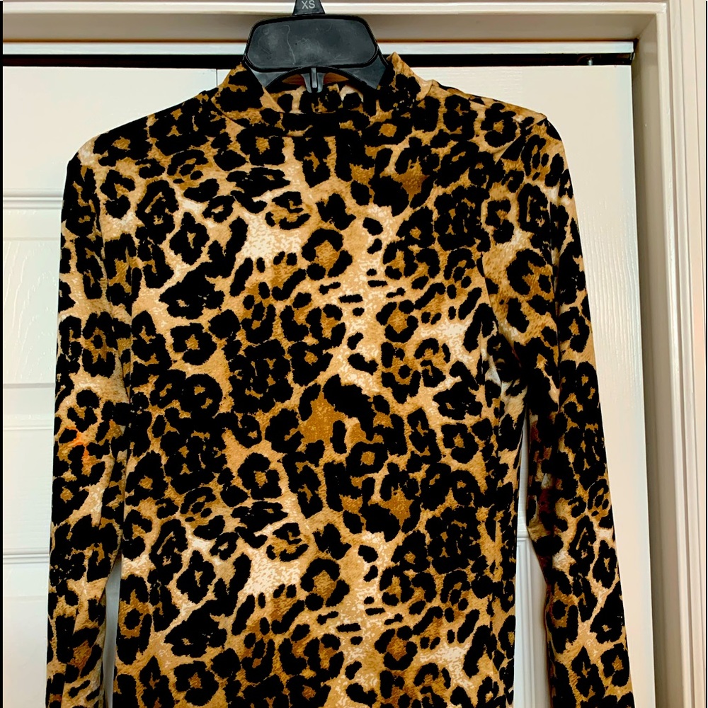 Long sleeve leopard print mock turtleneck